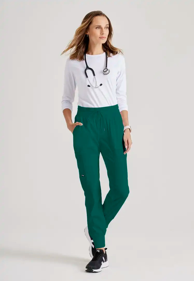Grey's Anatomy™ Spandex Stretch "Carly" 7-Pocket Mid-Rise Jogger Scrub Pant - Hunter Green - The Uniform Store