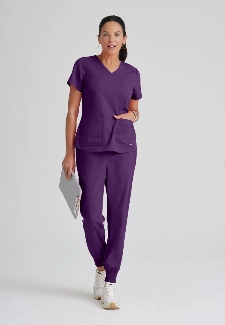 Grey's Anatomy™ Spandex Stretch "Emma" 4-Pocket V-Neck Scrub Top - Eggplant - The Uniform Store