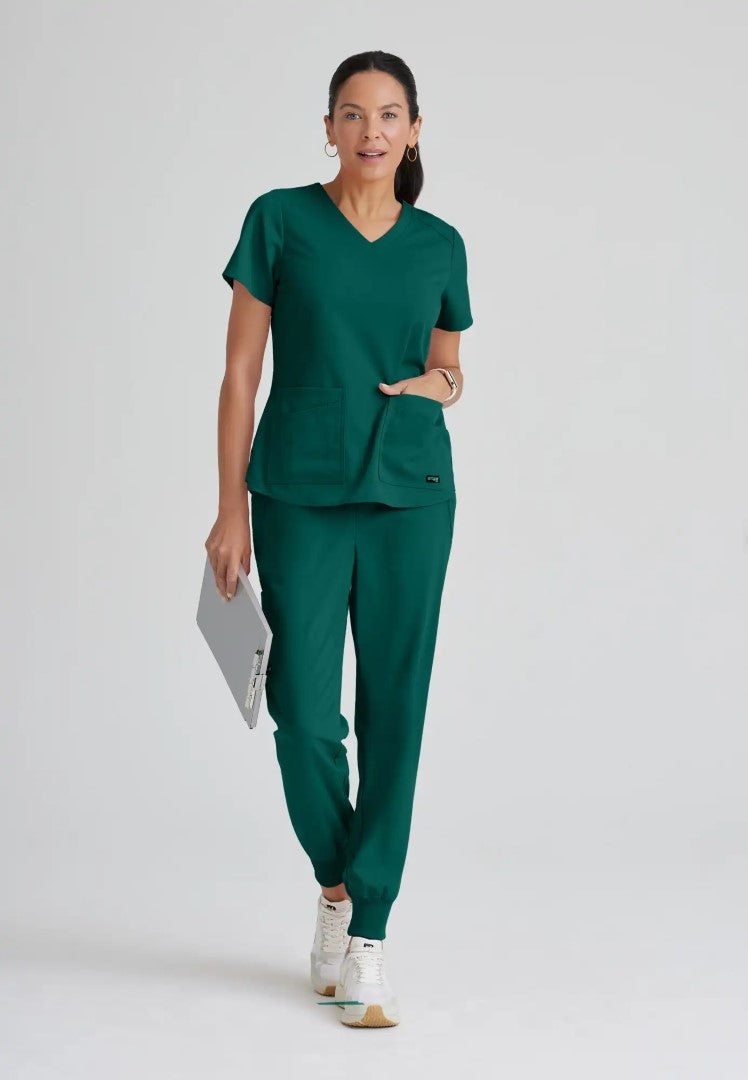 Grey's Anatomy™ Spandex Stretch "Emma" 4-Pocket V-Neck Scrub Top - Hunter Green - The Uniform Store