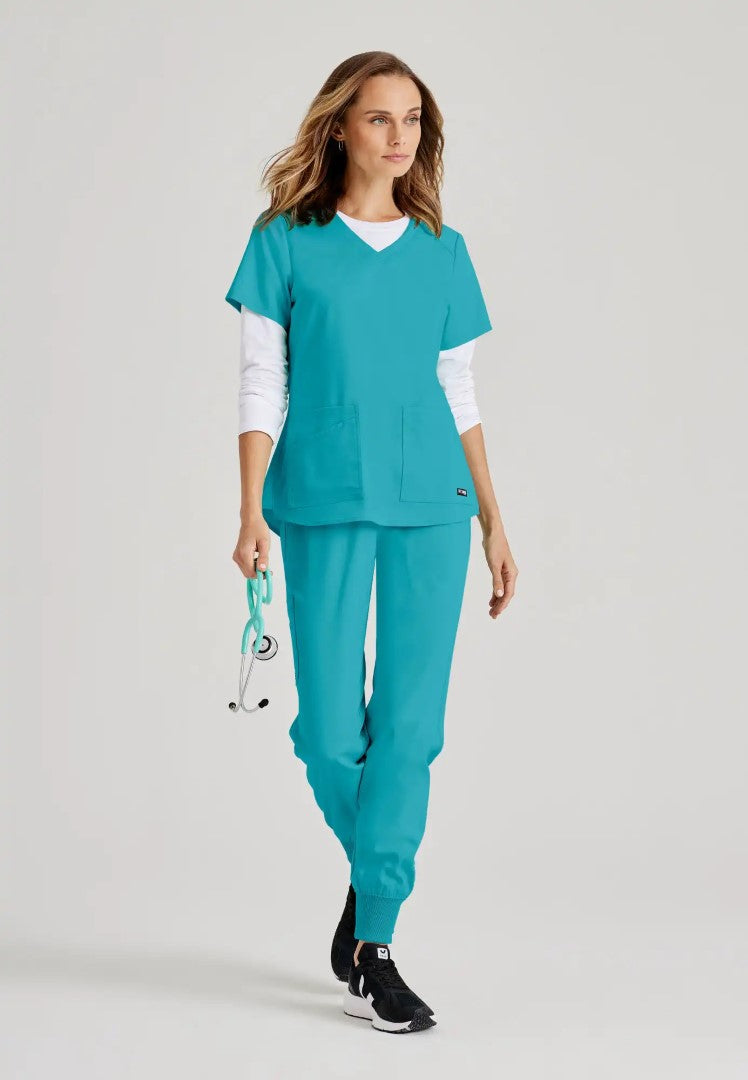 Grey's Anatomy™ Spandex Stretch "Emma" 4-Pocket V-Neck Scrub Top - Teal - The Uniform Store