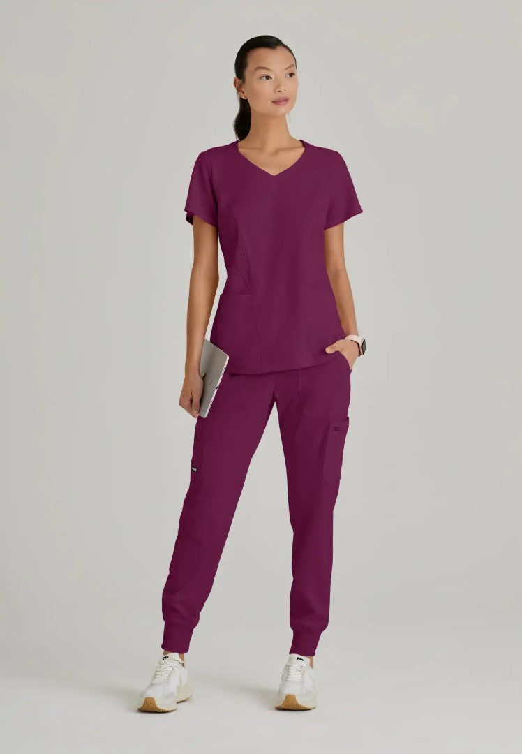 Grey's Anatomy™ Spandex Stretch "Carly" 3-Pocket Curved V-Neck Scrub Top - Wine