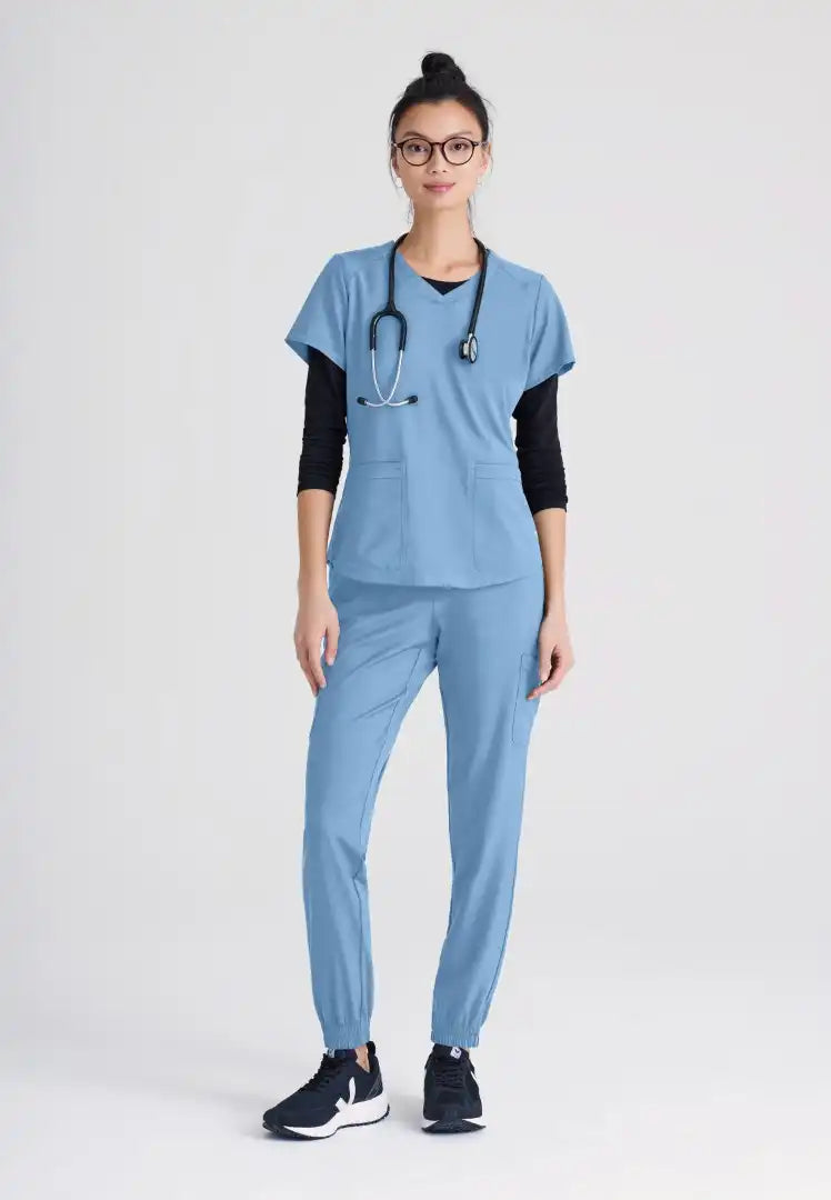 Grey's Anatomy™ Evolve "Rhythm" 2-Pocket Piped V-Neck Top - Ciel Blue