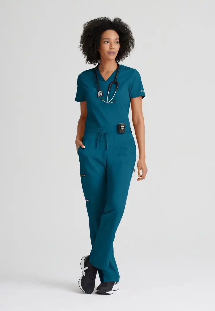 Grey's Anatomy™ Spandex Stretch "Bree" 1-Pocket Tuck In Top - Bahama - The Uniform Store