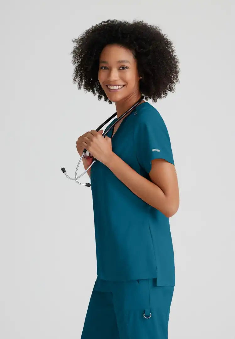Grey's Anatomy™ Spandex Stretch "Bree" 1-Pocket Tuck In Top - Bahama