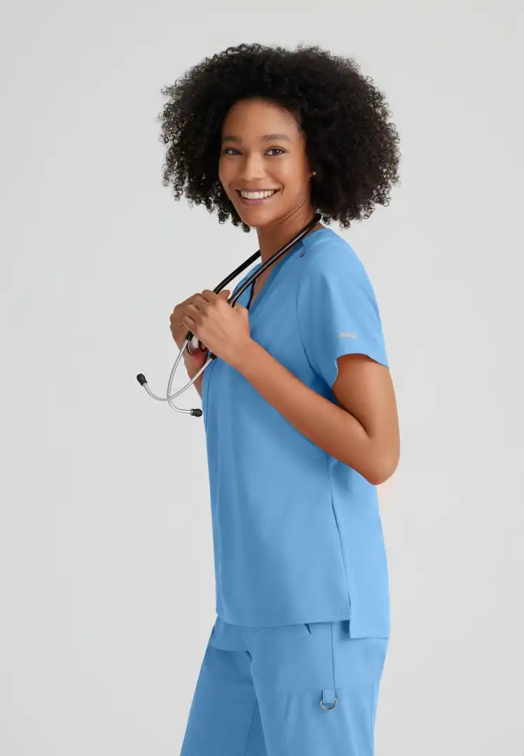 Grey's Anatomy™ Spandex Stretch "Bree" 1-Pocket Tuck In Top - Ciel Blue
