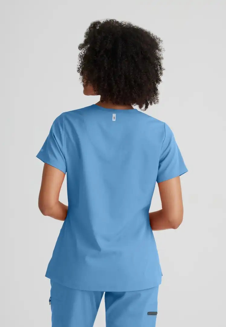 Grey's Anatomy™ Spandex Stretch "Bree" 1-Pocket Tuck In Top - Ciel Blue