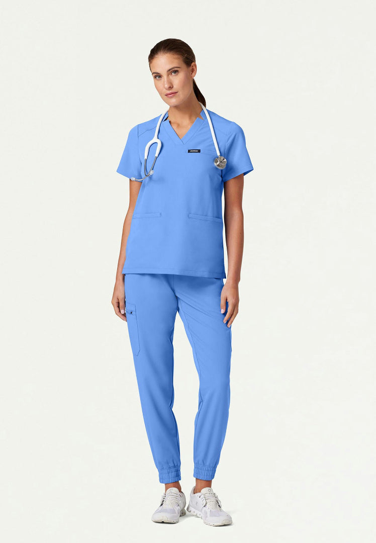 Blusa médica con cuello en V y muescas Helia - Azul cielo
