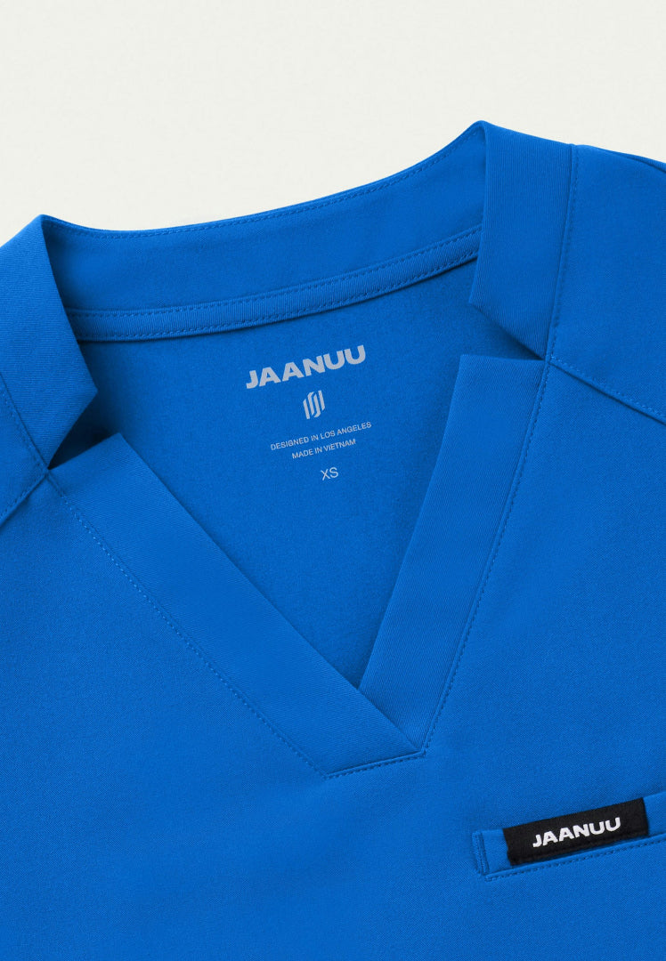 Blusa médica con cuello en V y muescas Helia - Azul rey
