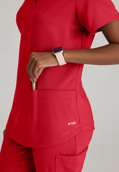 Haut col V passepoilé à 2 poches « Rhythm » de Grey's Anatomy Evolve - Rouge véritable