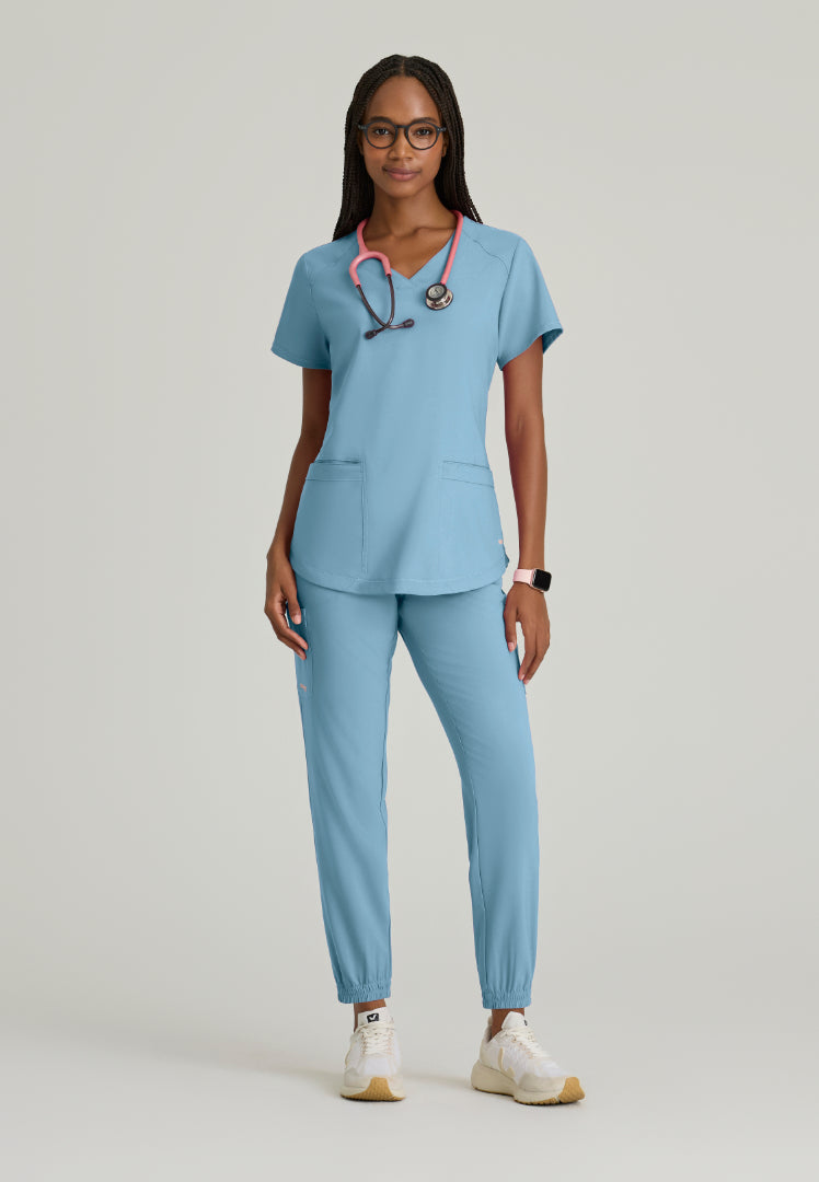 Grey's Anatomy™ Evolve "Rhythm" 2-Pocket Piped V-Neck Top - Ocean Mist