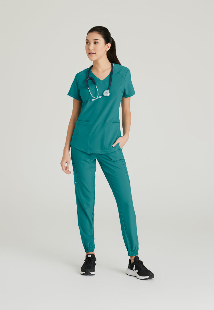 Grey's Anatomy™ Evolve "Rhythm" 2-Pocket Piped V-Neck Top - Teal