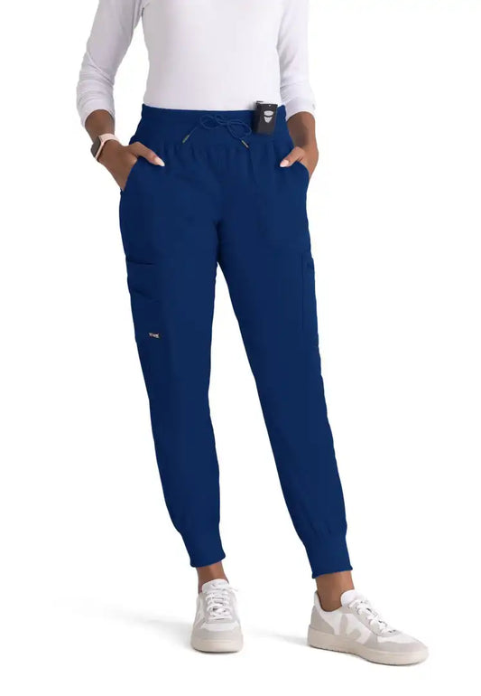 Grey's Anatomy™ Spandex Stretch "Carly" 7-Pocket Mid-Rise Jogger Scrub Pant - Indigo - The Uniform Store