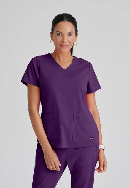 Grey's Anatomy™ Spandex Stretch "Emma" 4-Pocket V-Neck Scrub Top - Eggplant - The Uniform Store