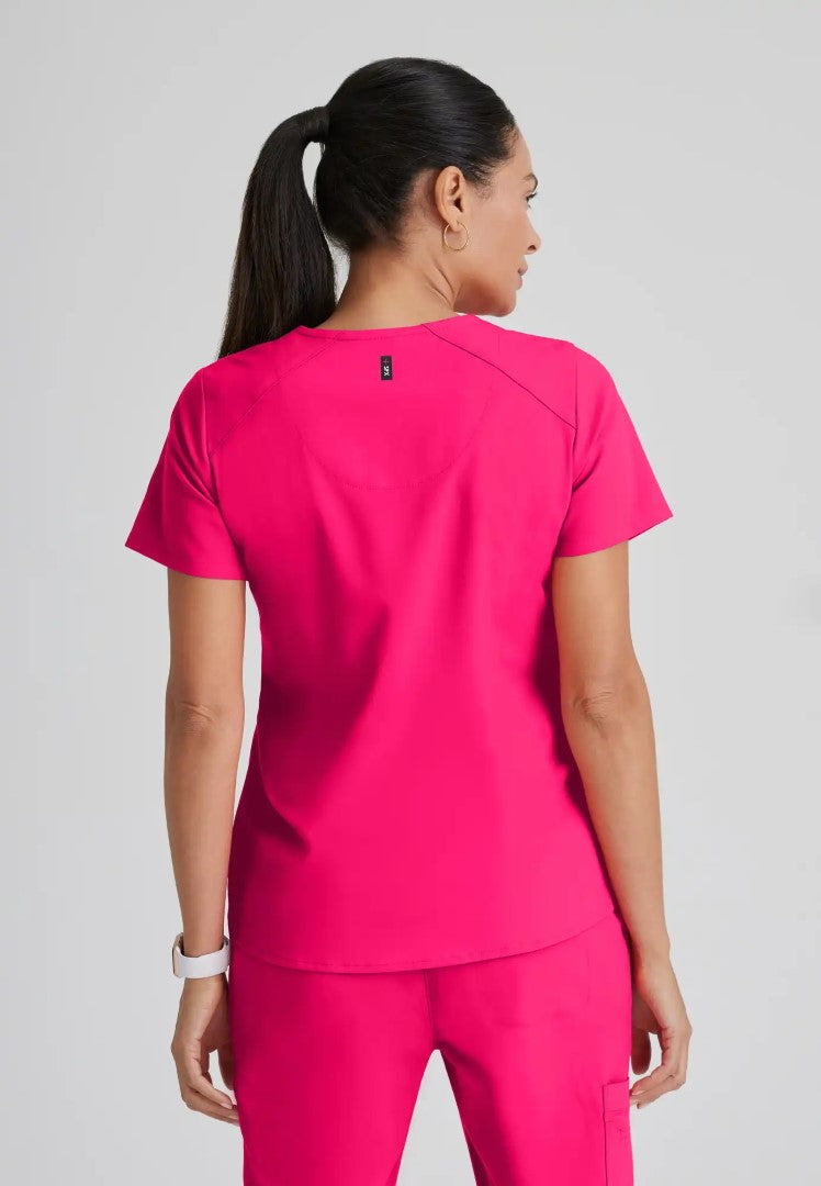 Haut d'uniforme médical à 4 poches et col en V Emma - Vibrance Pink