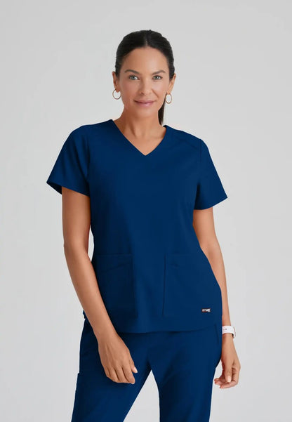 Grey's Anatomy™ Spandex Stretch "Emma" 4-Pocket V-Neck Scrub Top - Indigo - The Uniform Store