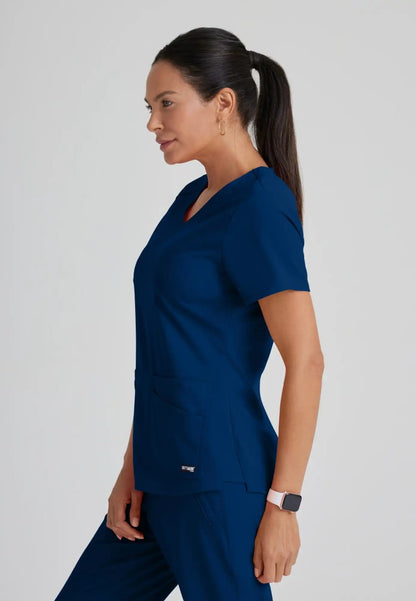 Grey's Anatomy™ Spandex Stretch "Emma" 4-Pocket V-Neck Scrub Top - Indigo - The Uniform Store