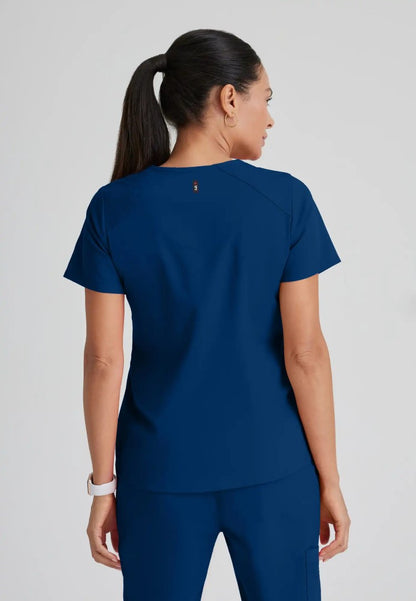 Grey's Anatomy™ Spandex Stretch "Emma" 4-Pocket V-Neck Scrub Top - Indigo - The Uniform Store