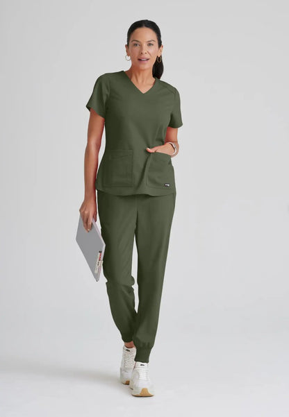 Grey's Anatomy™ Spandex Stretch "Emma" 4-Pocket V-Neck Scrub Top - Olive - The Uniform Store