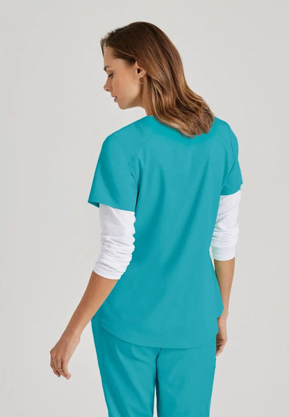 Grey's Anatomy™ Spandex Stretch "Emma" 4-Pocket V-Neck Scrub Top - Teal - The Uniform Store
