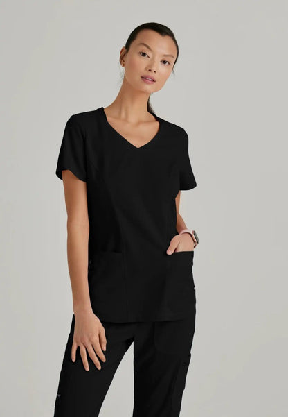 Grey's Anatomy™ Spandex Stretch "Carly" 3-Pocket Curved V-Neck Scrub Top - Black - The Uniform Store