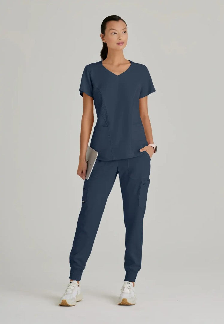 Grey's Anatomy™ Spandex Stretch "Carly" 3-Pocket Curved V-Neck Scrub Top - Steel - The Uniform Store