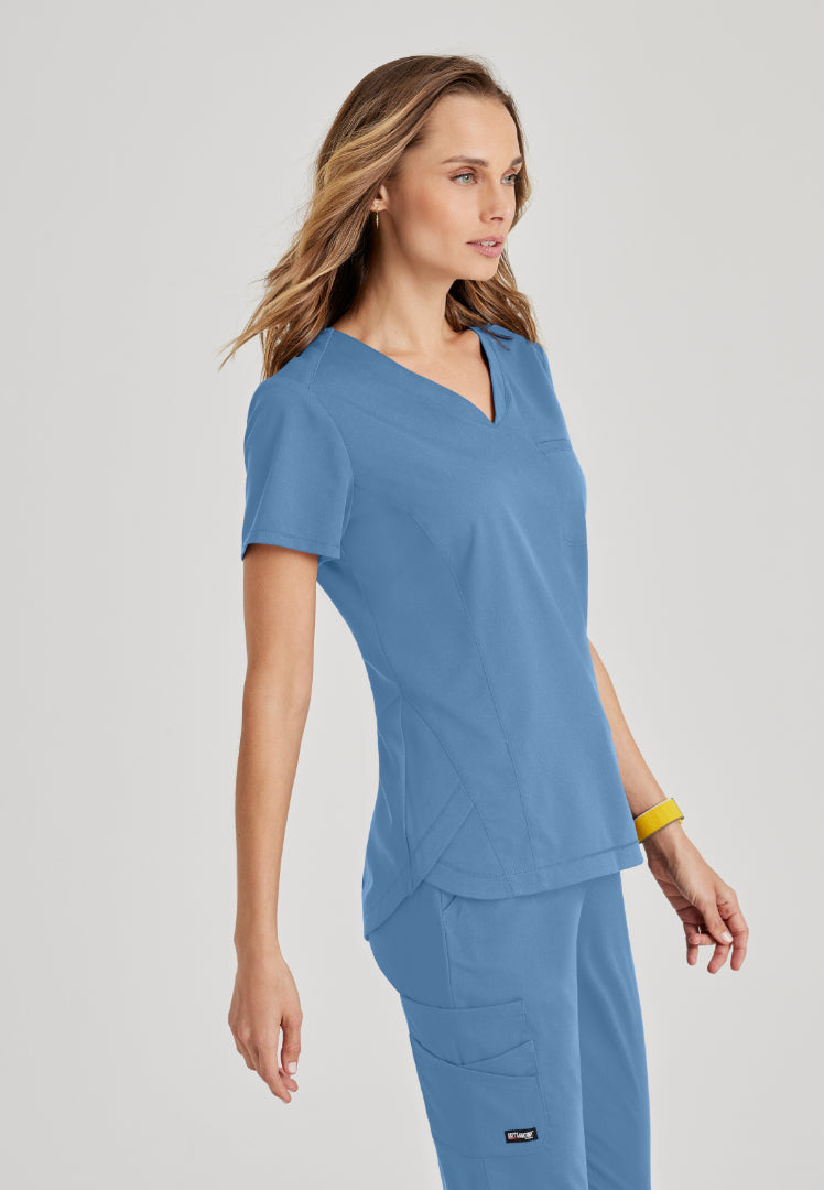 Grey's Anatomy™ Spandex Stretch "Capri" 2-Pocket Scrub Top - Ciel Blue