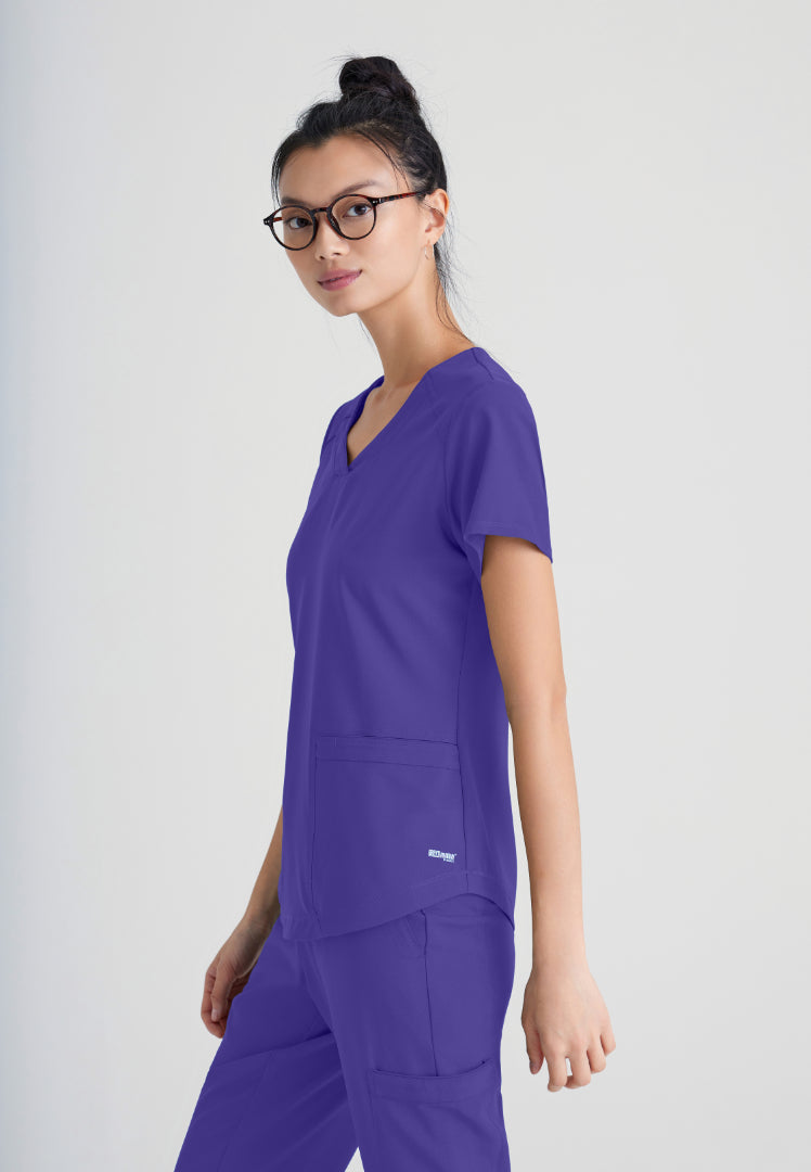 Grey's Anatomy™ Evolve "Rhythm" 2-Pocket Piped V-Neck Top - New Grape