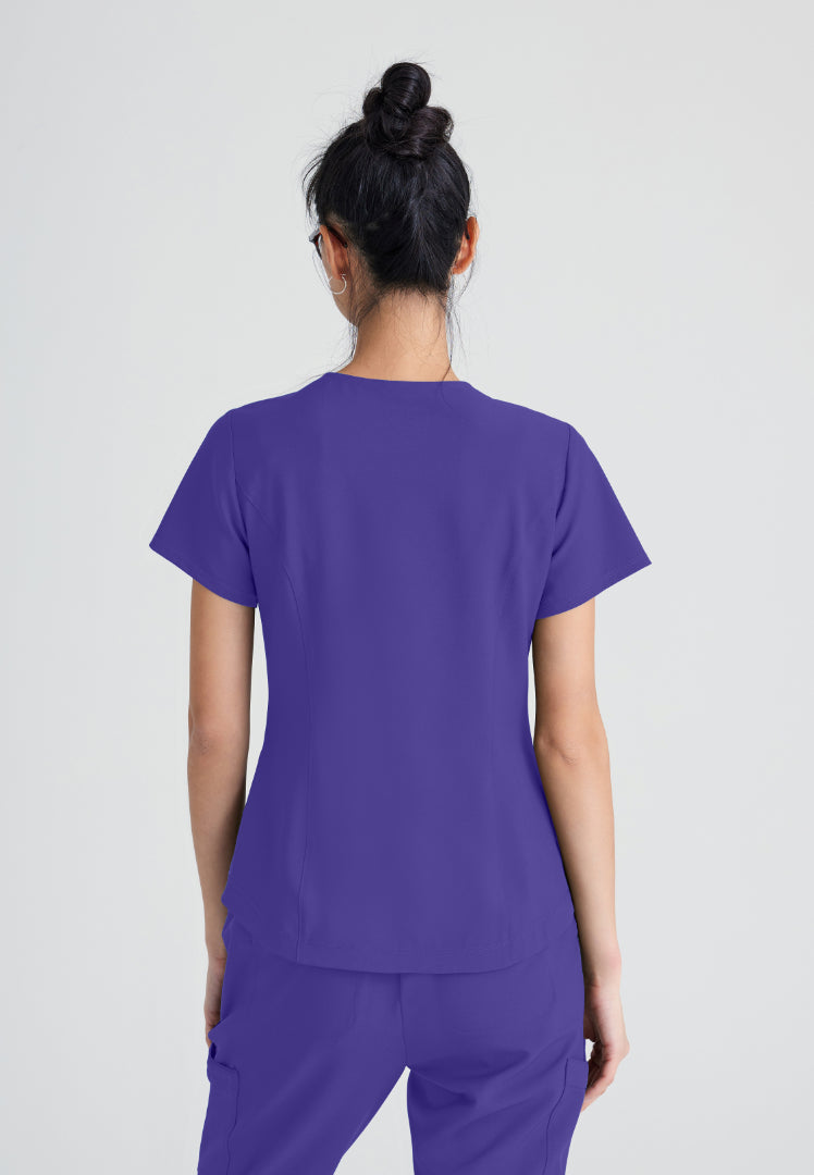 Grey's Anatomy™ Evolve "Rhythm" 2-Pocket Piped V-Neck Top - New Grape