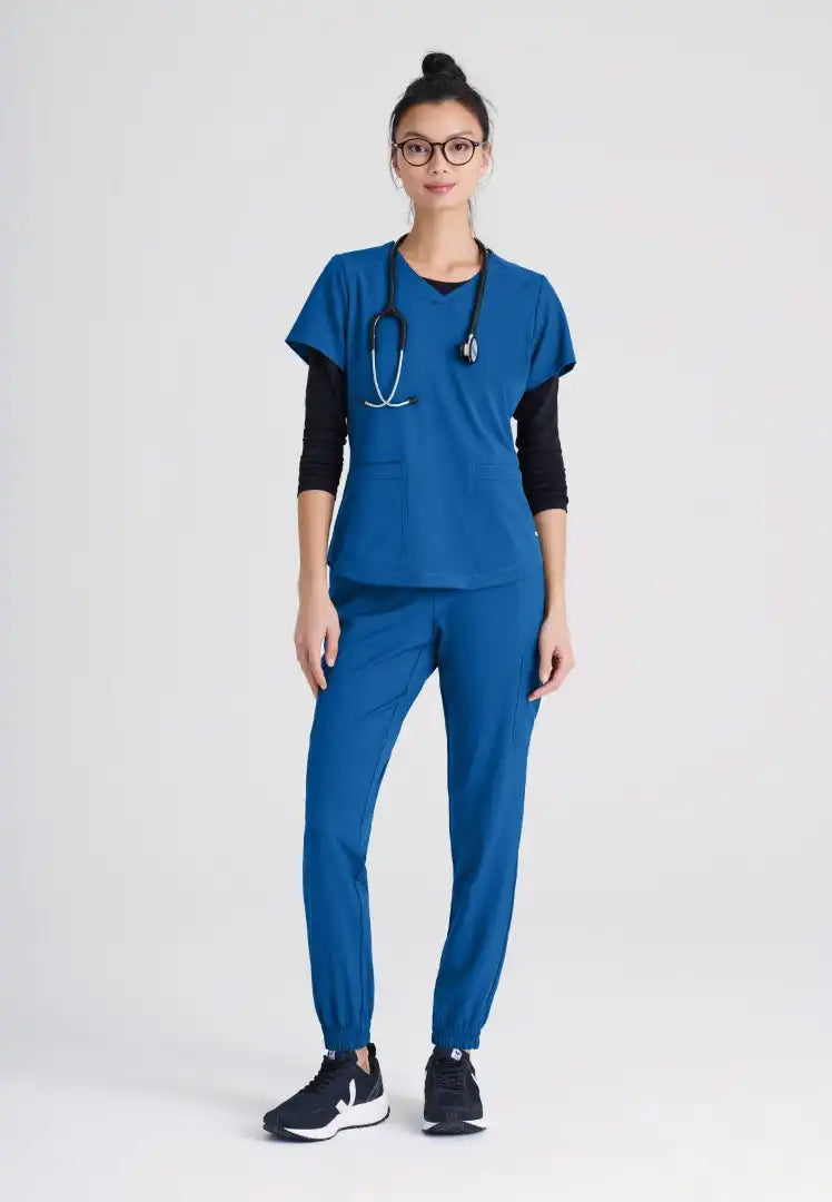 Grey's Anatomy™ Evolve "Rhythm" 2-Pocket Piped V-Neck Top - New Royal - The Uniform Store