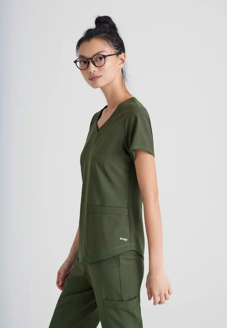 Grey's Anatomy™ Evolve "Rhythm" 2-Pocket Piped V-Neck Top - Fern - The Uniform Store