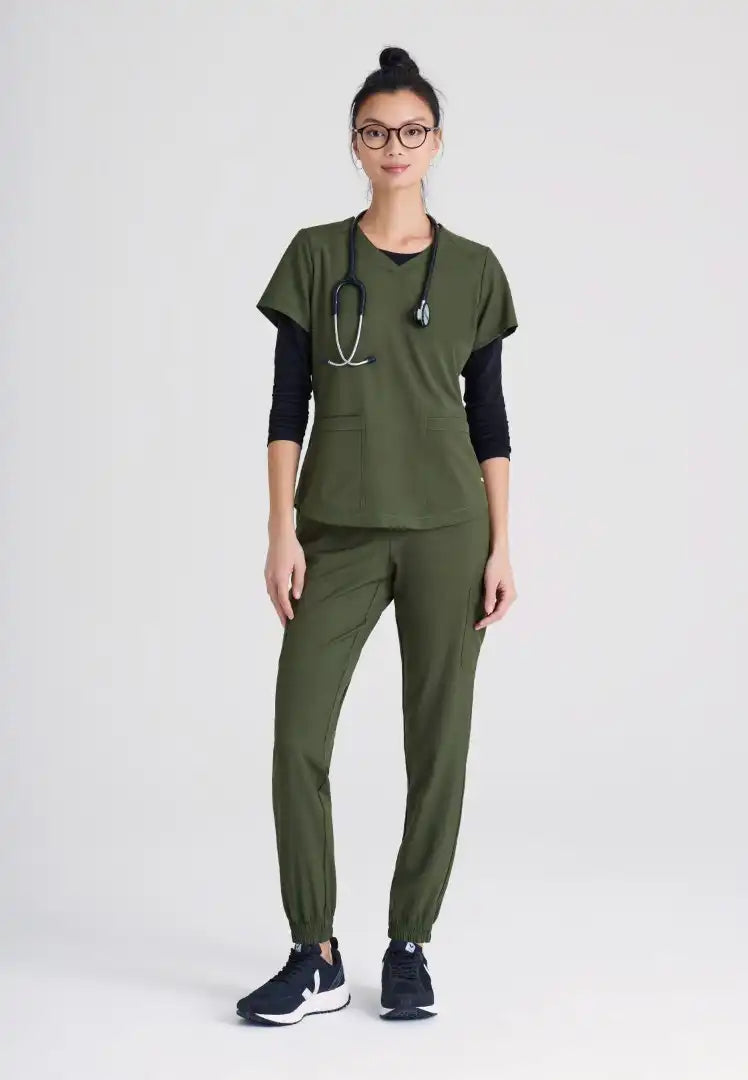 Grey's Anatomy™ Evolve "Rhythm" 2-Pocket Piped V-Neck Top - Fern - The Uniform Store