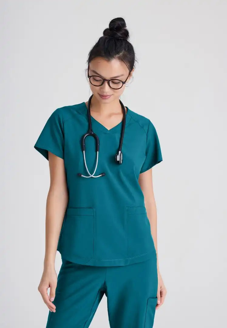Grey's Anatomy™ Evolve "Rhythm" 2-Pocket Piped V-Neck Top - Bahama - The Uniform Store