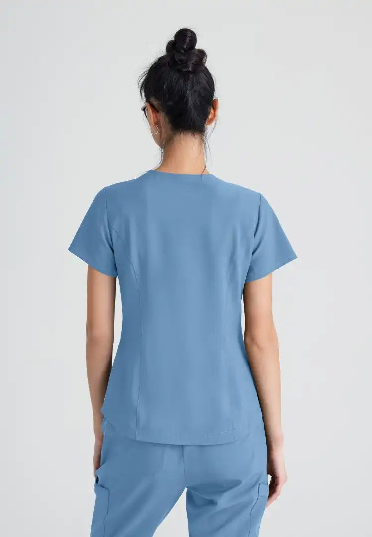 Grey's Anatomy™ Evolve "Rhythm" 2-Pocket Piped V-Neck Top - Ciel Blue - The Uniform Store