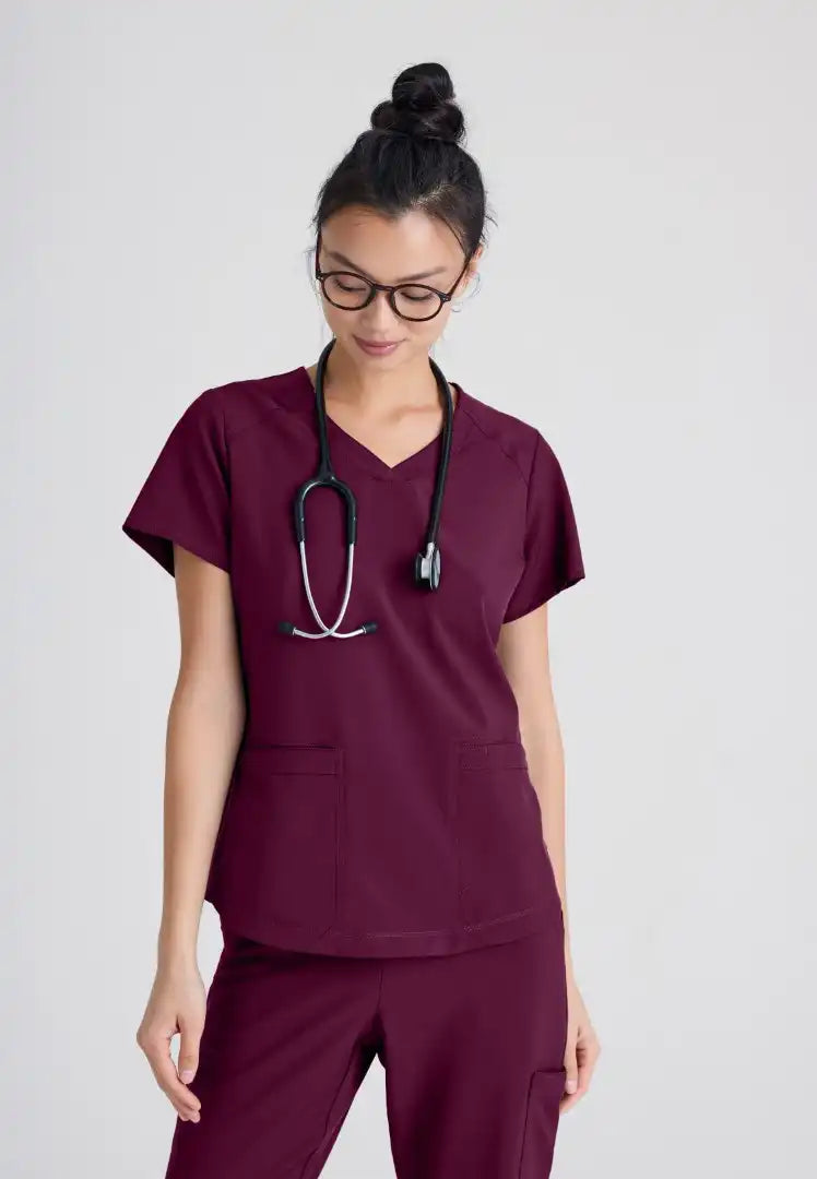 Grey's Anatomy™ Evolve "Rhythm" 2-Pocket Piped V-Neck Top - Wine - The Uniform Store