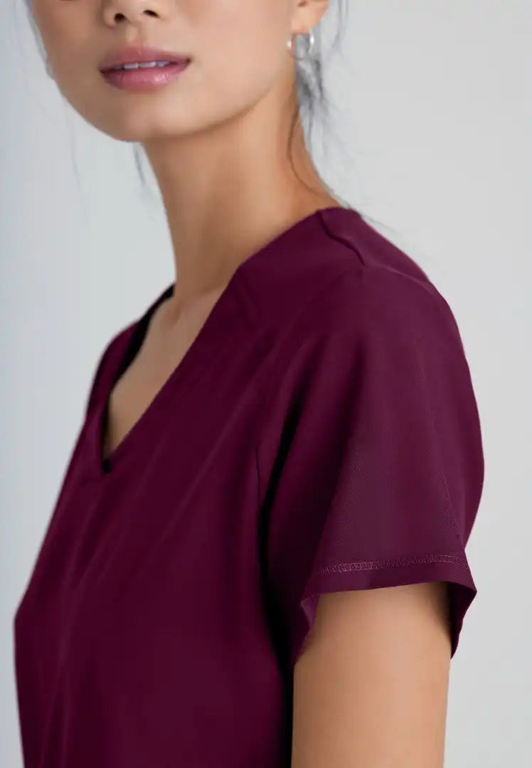 Grey's Anatomy™ Evolve "Rhythm" 2-Pocket Piped V-Neck Top - Wine - The Uniform Store