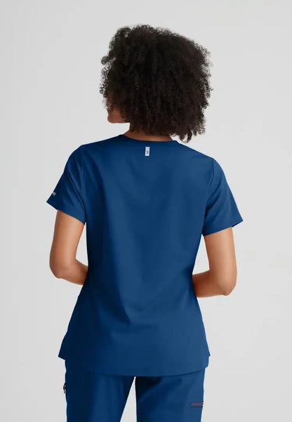 Grey's Anatomy™ Spandex Stretch "Bree" 1-Pocket Tuck In Top - Indigo - The Uniform Store