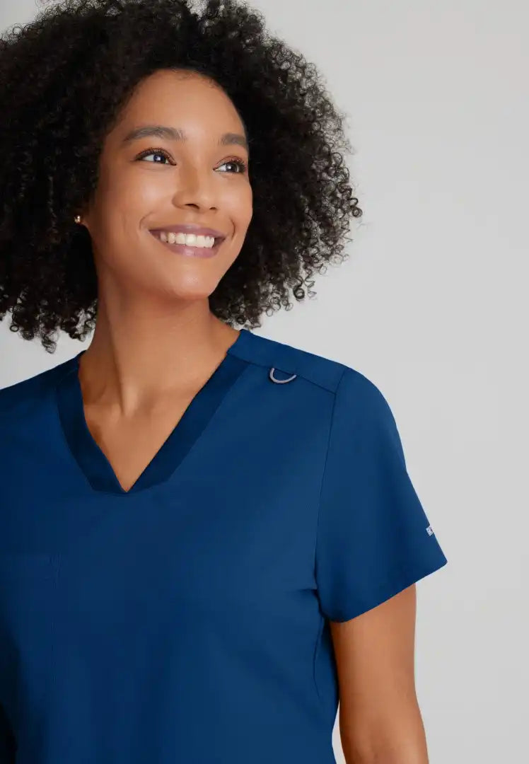 Grey's Anatomy™ Spandex Stretch "Bree" 1-Pocket Tuck In Top - Indigo - The Uniform Store