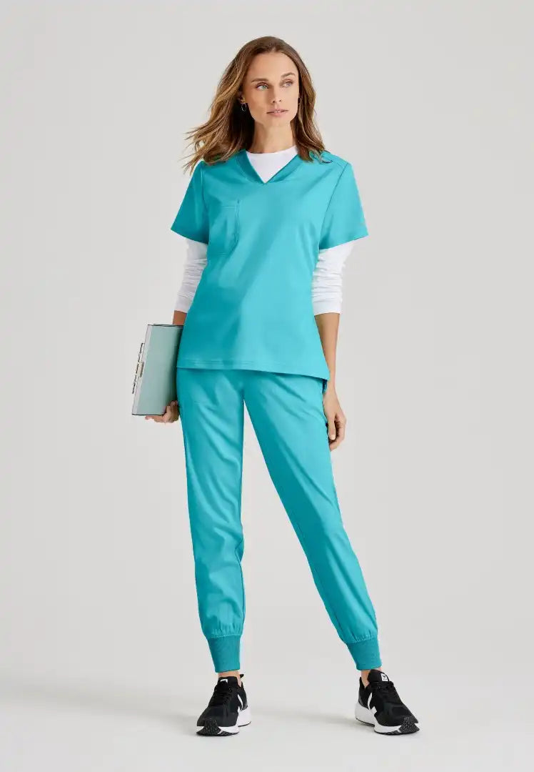 Grey's Anatomy™ Spandex Stretch "Bree" 1-Pocket Tuck In Top - Teal ...