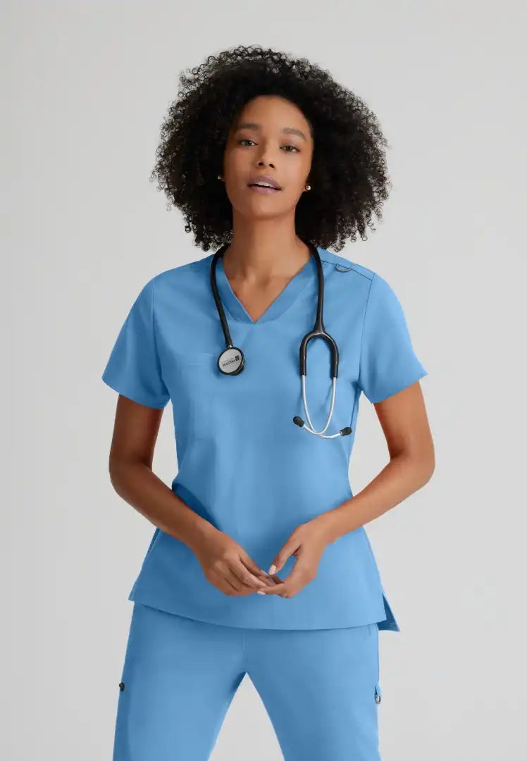 Grey's Anatomy™ Spandex Stretch "Bree" 1-Pocket Tuck In Top - Ciel Blue - The Uniform Store