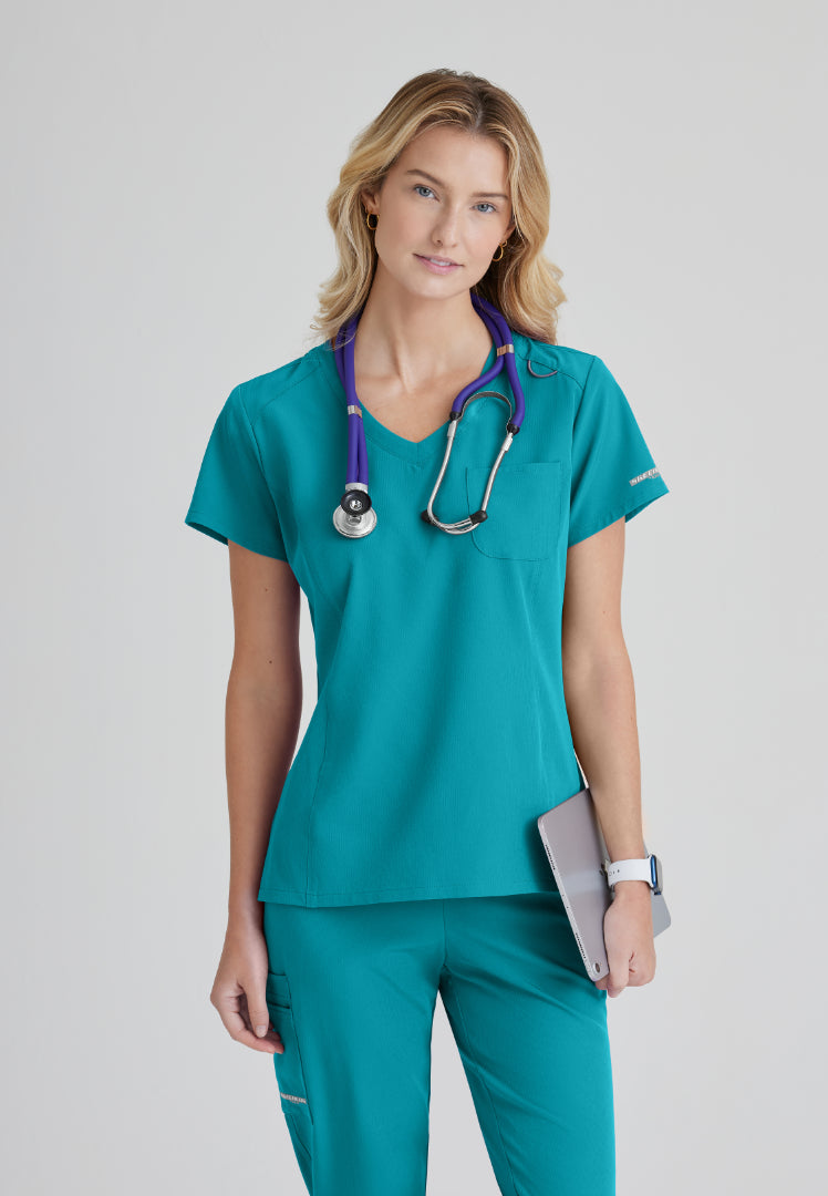 Skechers™ "Dignity" Single Pocket Tuck In Top - Teal