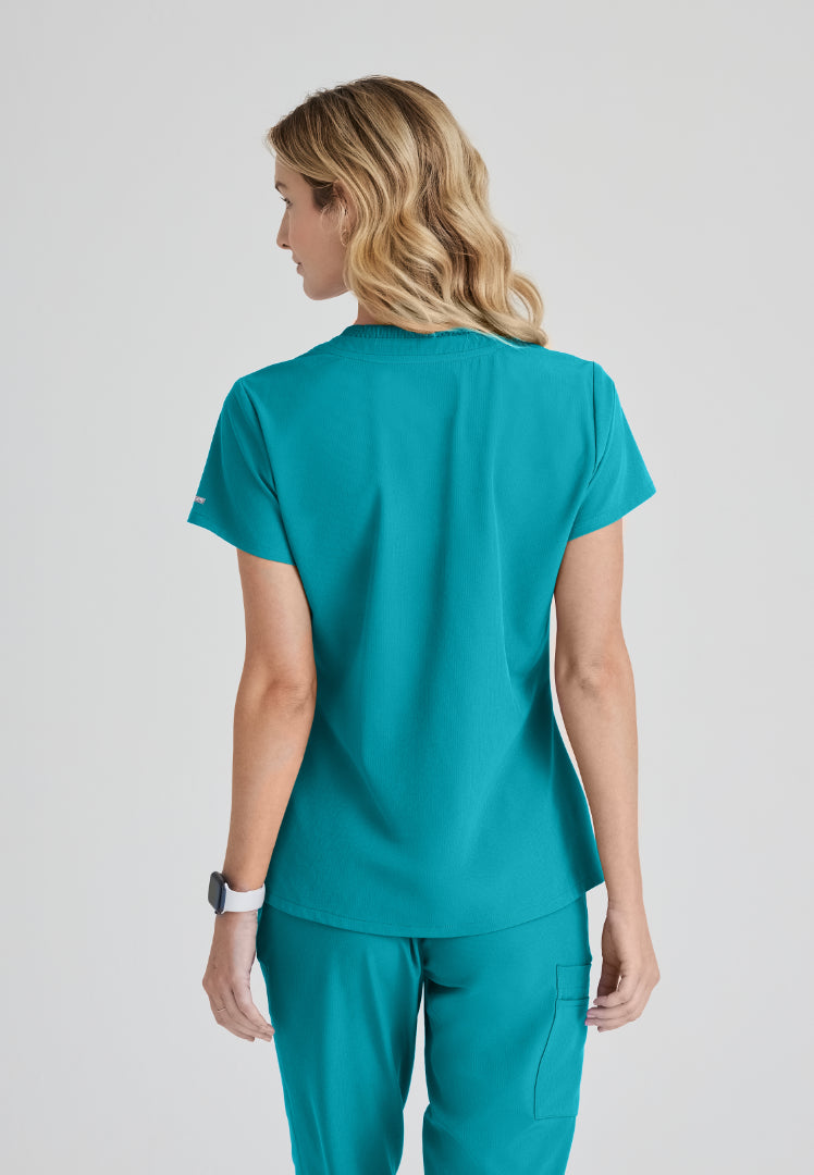 Skechers™ "Dignity" Single Pocket Tuck In Top - Teal