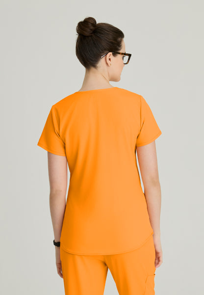 Haut d'uniforme médical à col en V « Breeze » de Skechers - Souci brillant