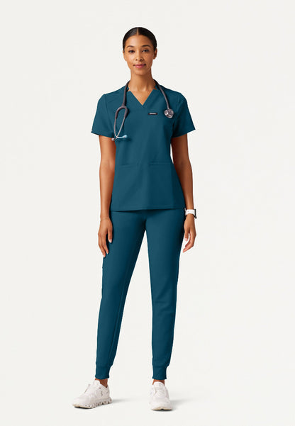 Blusa médica Helia Slim con cuello en V y muescas - Azul Caribe